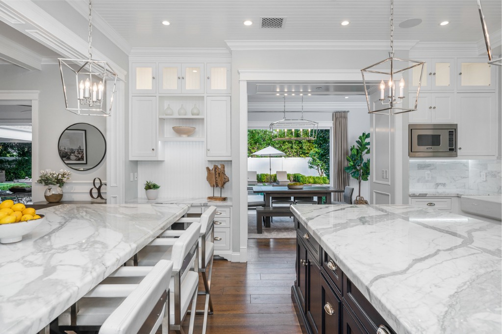 A marble kitchen is seen. Beyond Build & Power offers Kitchen Remodeling in St. Petersburg FL.